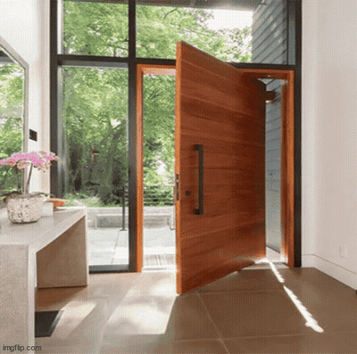 Large Open Wooden Door With Black Handle GIF