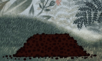 Large Pile Of Dirt In Grass GIF