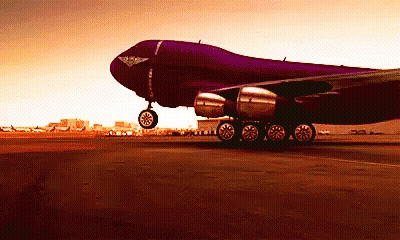 Large Purple Airplane Taking Off GIF