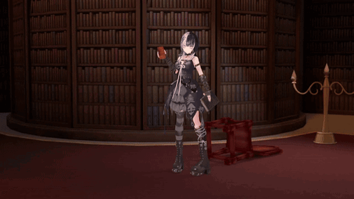 Large Red Cube On Table In Front Of Library GIF