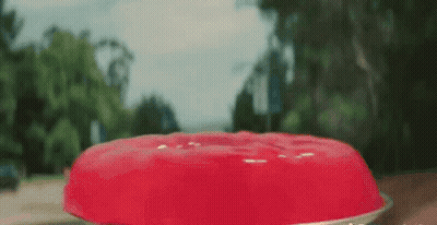 Large Red Jelly On Table GIF