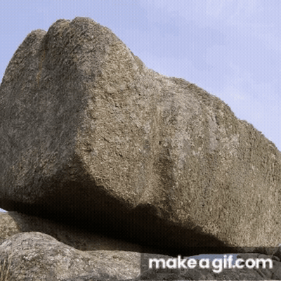 Large Rock In Front Of Banner GIF