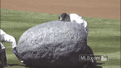 Large Rock On Baseball Field With MLB.com Logo GIF