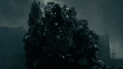 Large Rock With Lights In Dark GIF