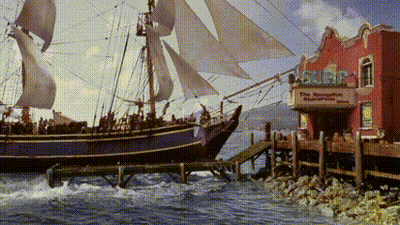 Large Sailboat Docked At Surf Shop GIF