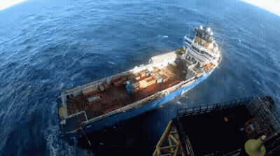Large Ship With Containers Floating In Ocean GIF