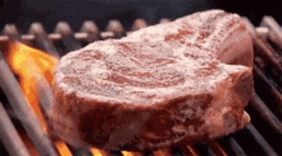 Large Steak Cooking On Grill GIF