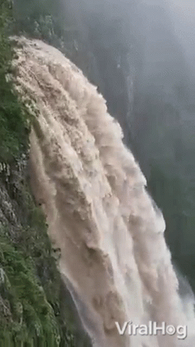 Large Waterfall Falling Down Cliff GIF