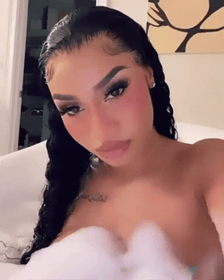 Latto Posing On Her Phone's Camera GIF