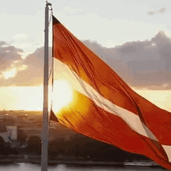 Latvian Flag On Sunrise GIF