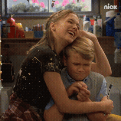 Laughing Girl Hugging Boy By Nick Sign GIF