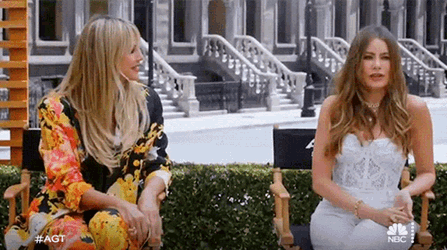 Laughing Heidi Klum GIF