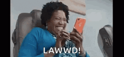 Laughing Hysterically Holding Phone GIF