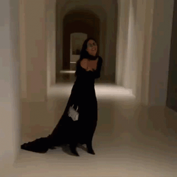 Laughing Kim K In A Black Dress GIF
