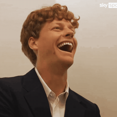 Laughing Man In Suit With Sky Logo GIF