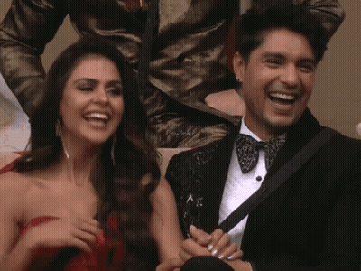 Laughing Man In Tuxedo And Woman In Red GIF