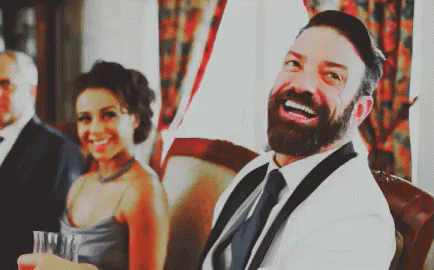 Laughing Man Sitting In Chair GIF