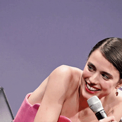 Laughing Margaret Qualley In Pink Outfit GIF