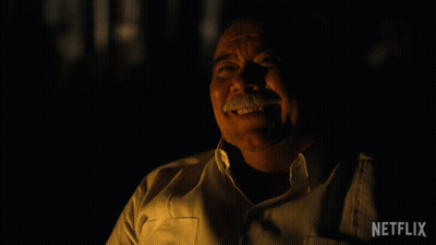 Laughing Mustache Man With Netflix Logo Behind GIF