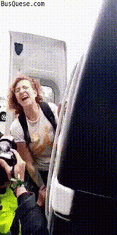 Laughing Woman Getting Out Of Van With Hood Open GIF