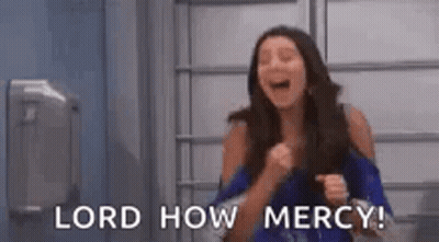 Laughing Woman Holding Fist Lord How Mercy GIF