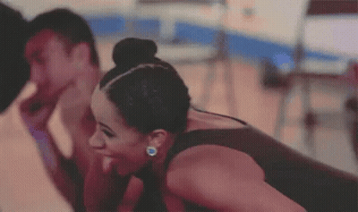 Laughing Woman With Bun GIF