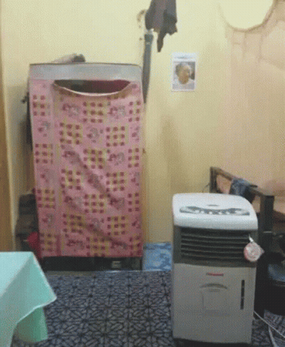 Laundry Room With Washer Dryer And Air Conditioner GIF