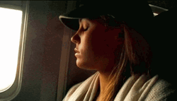Lauren Waking Up On Plane GIF