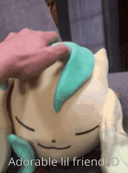 Leafeon Stuffed Toy Head GIF