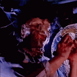 Leatherface Banging Head GIF