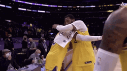 Lebron James And Andre Drummond Hug GIF