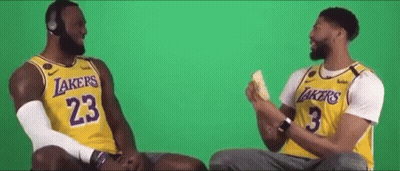 Lebron James And Anthony Davis Are Sitting Next To Each Other On A Green Screen . GIF