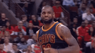 Lebron James Is A Basketball Player For The Cavs And Is Standing In Front Of A Crowd . GIF