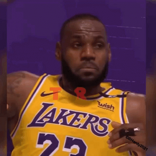 Lebron James Is Wearing A Lakers Jersey With The Number 23 On It GIF