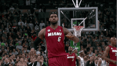 Lebron James Is Wearing A Red Miami Jersey During A Basketball Game GIF