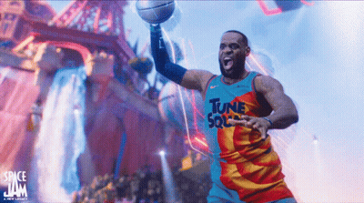 Lebron James Is Wearing A Tune Squad Jersey And Holding A Basketball GIF