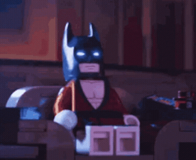 Lego Batman In Tuxedo With Glowing Eyes GIF
