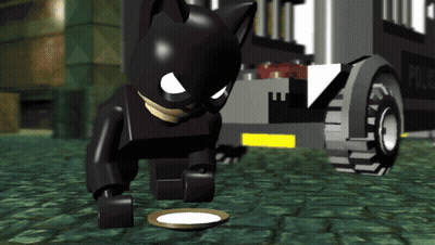 Lego Batman Looking At Food In Front Of Police Car GIF