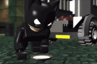 Lego Batman Standing Next To Plate GIF