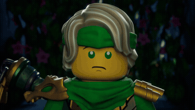 Lego Character With Green Scarf And Yellow Face GIF