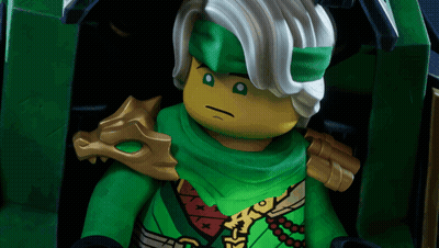 Lego Figure In Green Outfit Close Up GIF