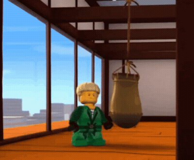 Lego Figure Standing In Front Of Punching Bag GIF