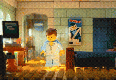 Lego Figure Standing In Room With Sports Poster GIF