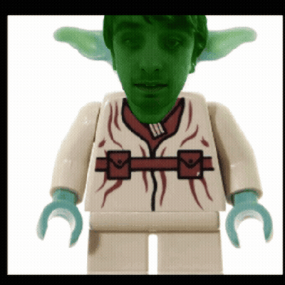 Lego Figure With Green Face And Red Shirt GIF