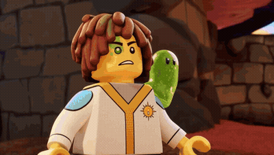 Lego Figure With Green Frog On Shoulder GIF