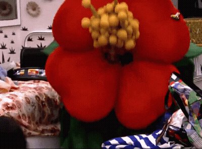 Lego Figure With Green Scarf GIF