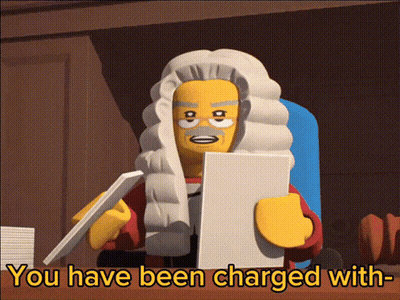 Lego Judge Holding Charge Paper GIF