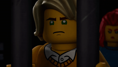 Lego Man Behind Bars Serious Look GIF