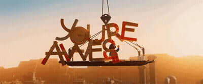 Lego Sign Saying You're Awesome Lifted By Crane GIF