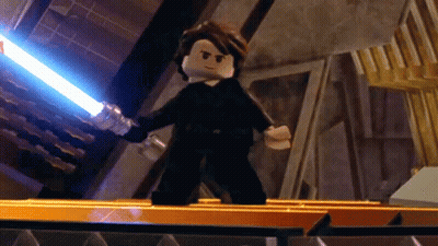 Lego Star Wars Character Holding Lightsaber GIF